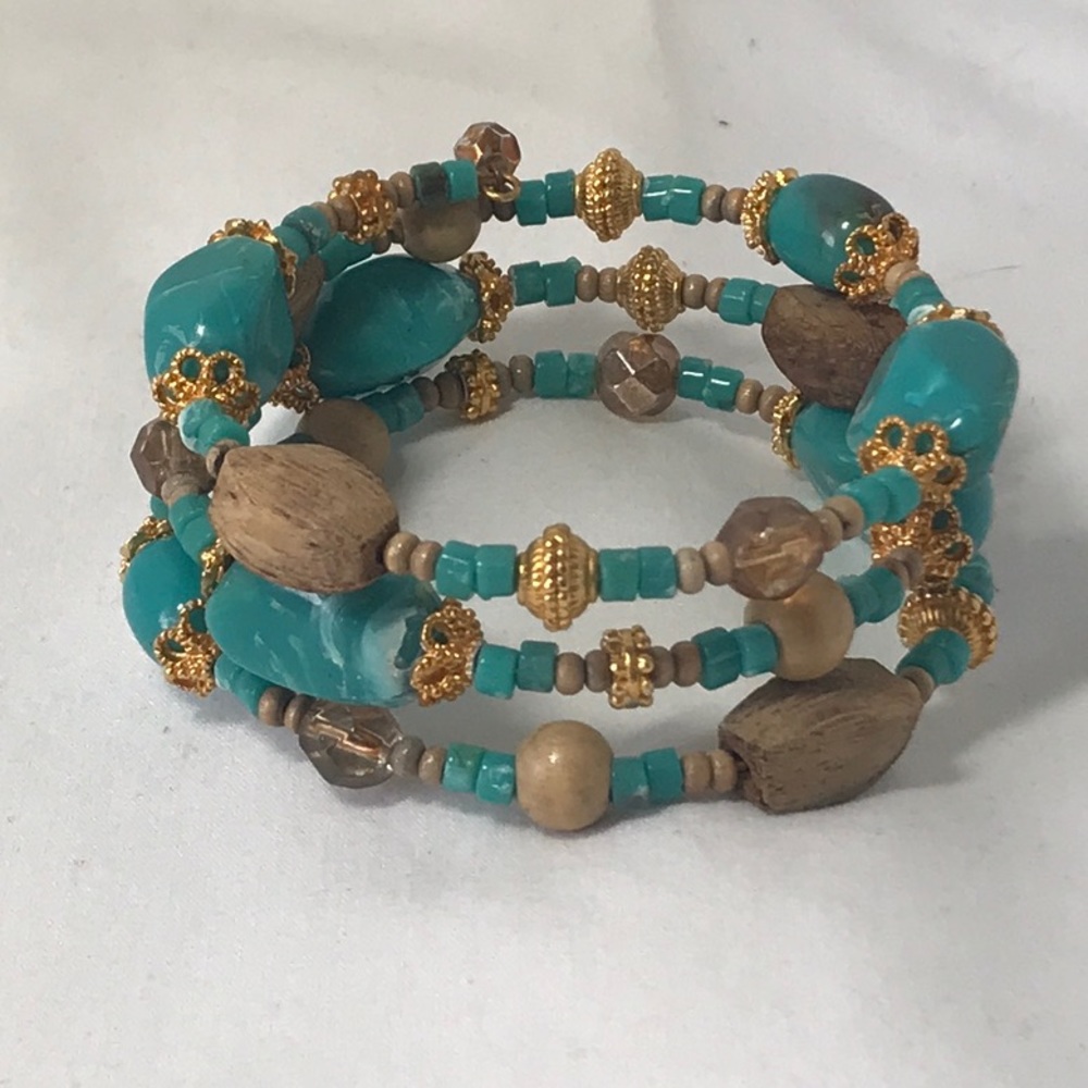 Teal color memory bracelet, gold tone beads